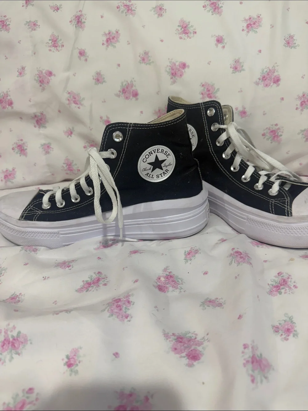 Converse women’s Black High-Top Platform Sneakers with White Laces